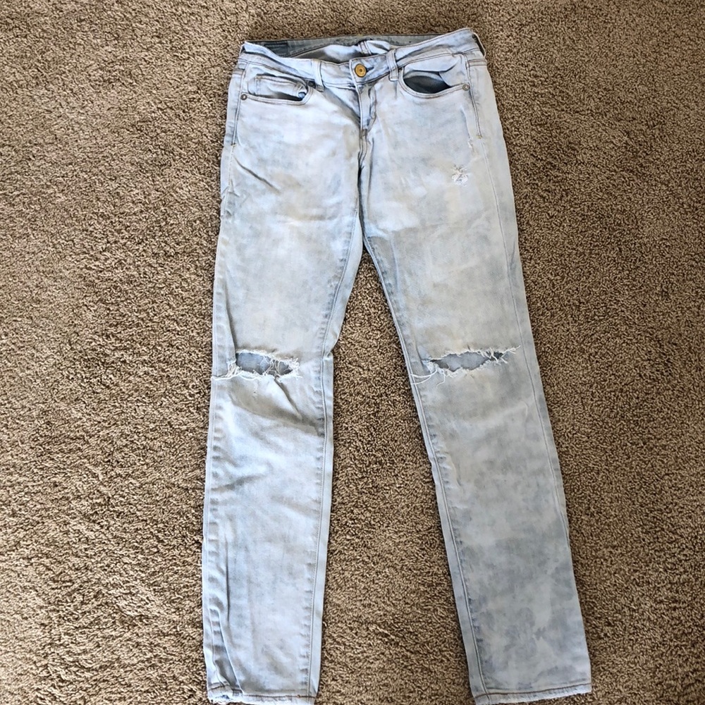 Distressed light wash skinny jeans